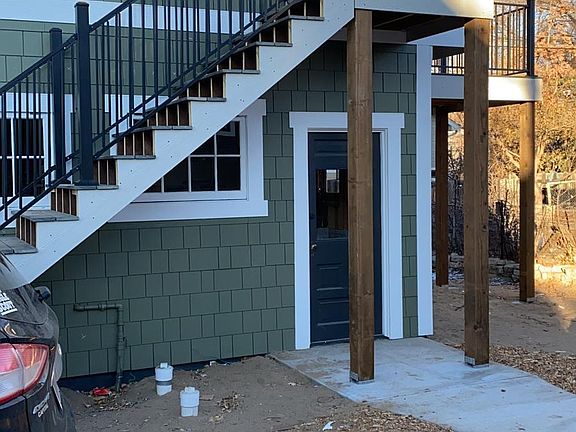 Second-floor private staircase to keyless entry.