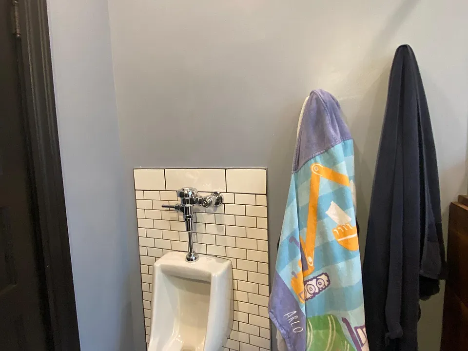 urinal in bathroom