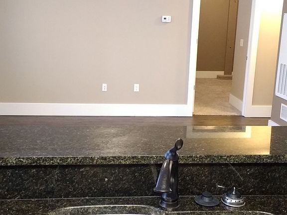 Open floor plan from kitchen to living room.