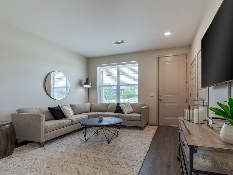 Hardwood-Style Flooring Throughout Main Living Areas *