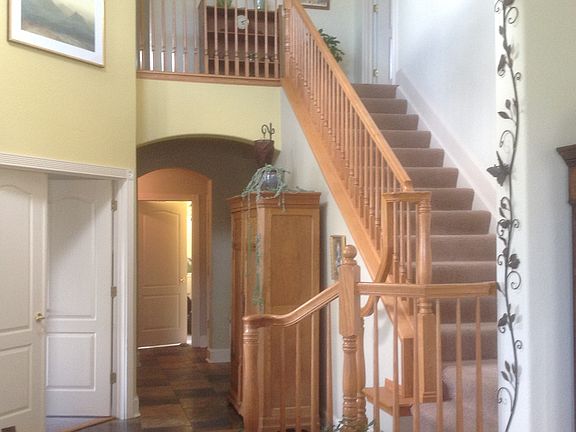 Entry Way with Oak Banisters