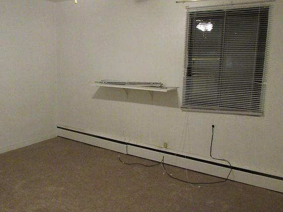 Spacious Bedroom with Closet and Ceiling Fan