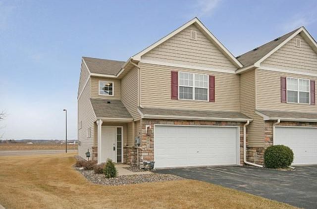 Welcome home to this lovely end unit town home located in Shakopee, MN. You will appreciate the open