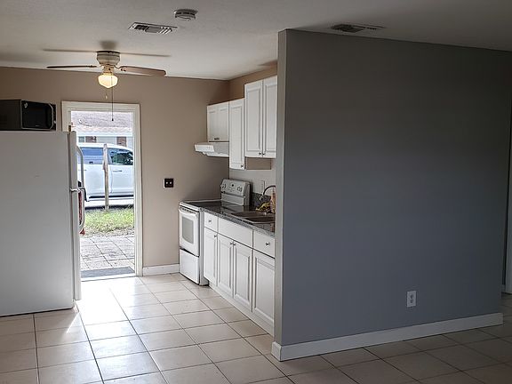 Kitchen Area and Dining Area near Refrigerator