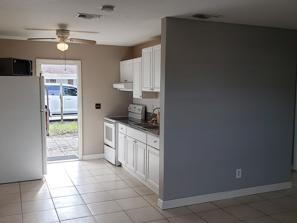 Kitchen Area and Dining Area near Refrigerator