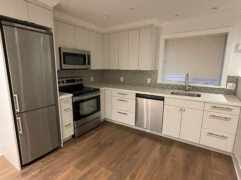 1427 W 40th Ave — Photo 1