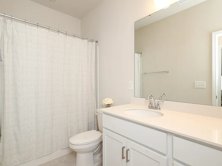 Full bathroom located near the secondary bedrooms