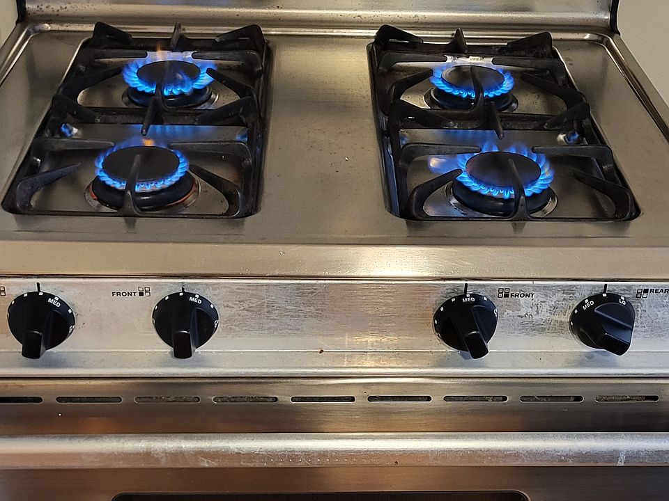 Updated photo of new stove and oven hood pending.