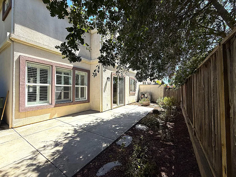 Fully Fenced Backyard with Low Maintenance Landscaping