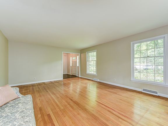 Oversized windows fill the room with natural light