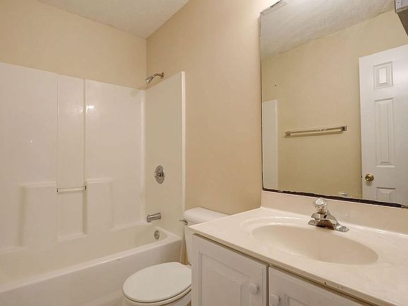 Bath with shower 