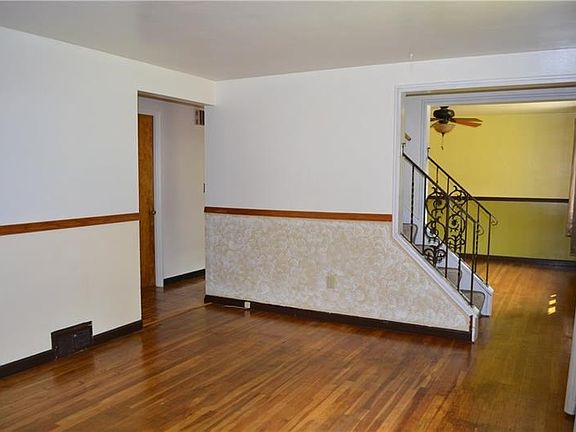 The living room is also accented with a wooden chair rail.