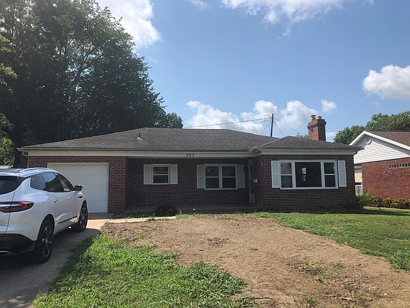 old photo of front right after new sewer line was put in - 2022