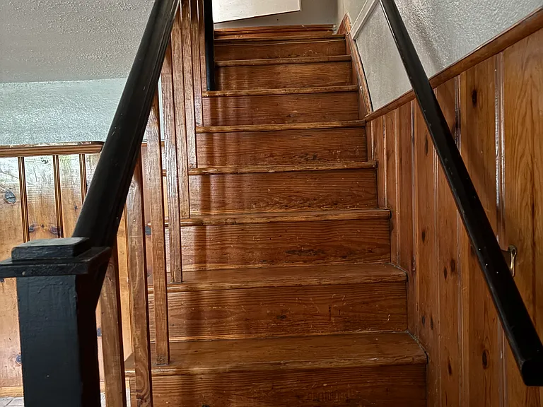 Stairs from lower level leading to main level