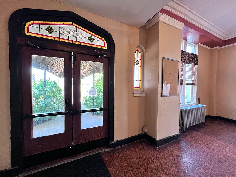 Looking out of front door from lobby.