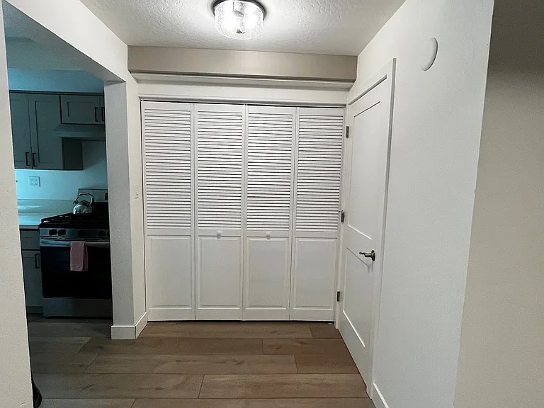 Downstairs unit - water heater and storage closet