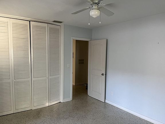 1st Bedroom (1 of 2). Bedroom has direct access to the lanai through a sliding glass door.