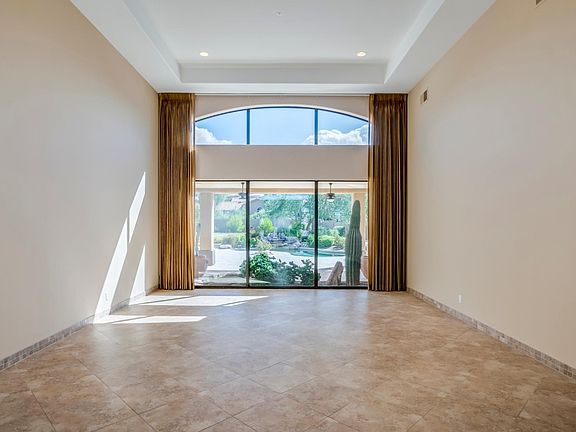 Living room with views to backyard
