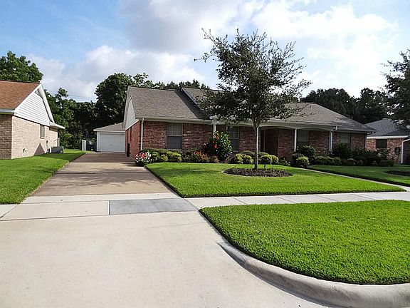 OWNERS LOVED THEIR YARD.... FRONT AND BACK.  YOUNG TREES HAVE BEEN PLANTED FOR THE NEW OWNERS.