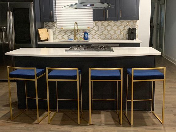 Open kitchen with island and plenty of space and storage