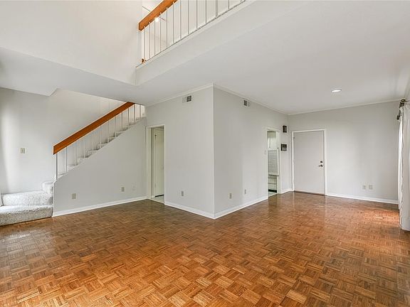 first floor living with attached garage and high ceilings