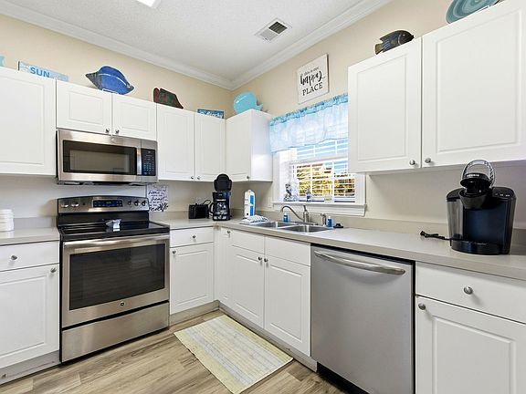 3rd image of 5750 Oyster Catcher Dr. #1113