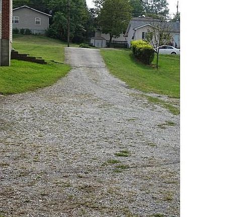 Property has a driveway from Tenbrook to the property.  2196 Tenbrook has a 12' easement to use this driveway.