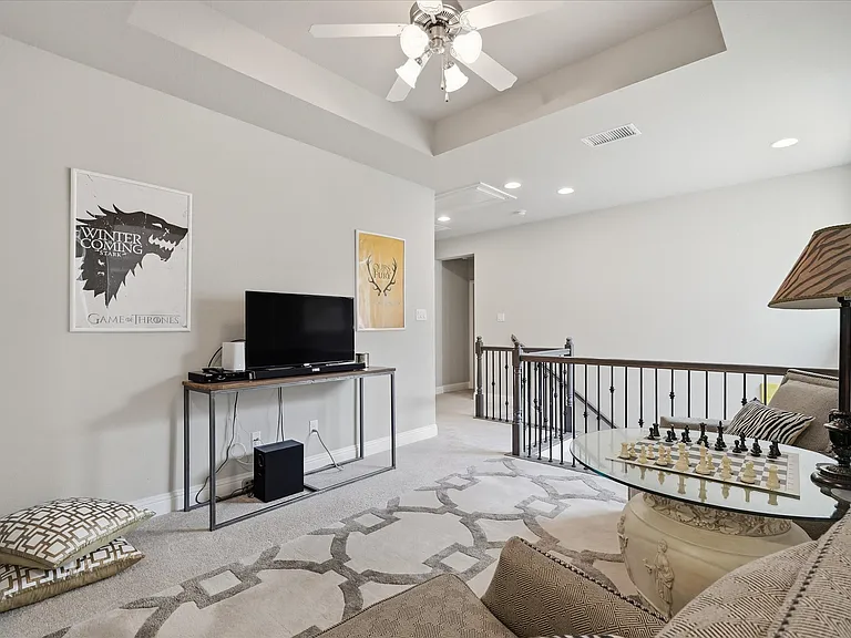 Discover the perfect bonus room designed to adapt to your lifestyle, whether utilized as a cozy media lounge, a home office, or a creative studio space.
