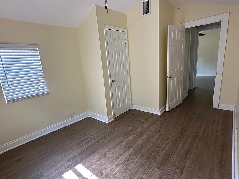 Back bedroom with full bathroom right next to it.