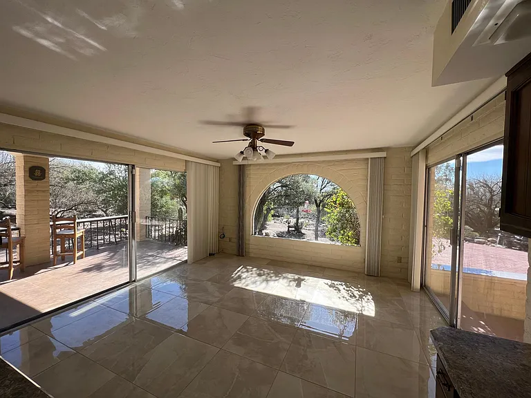 Dining area next to kitchen, sliding doors to rear porch and rear patio.
