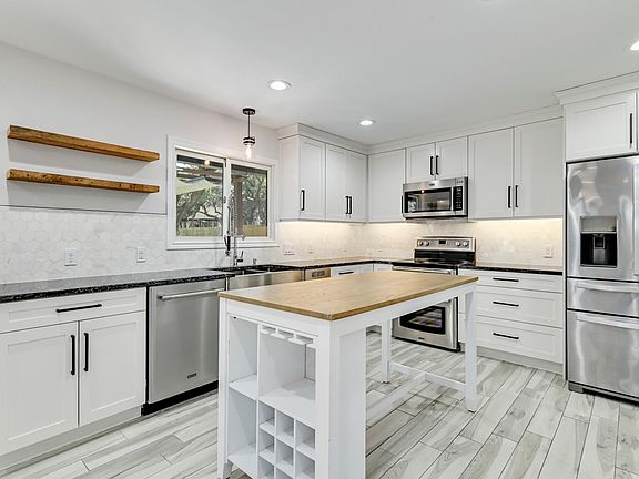 5th image of 11903 Highland Oaks Trl