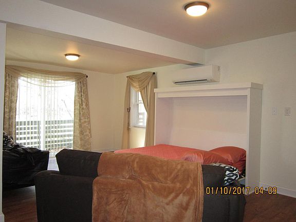 Living Area with Wall Bed