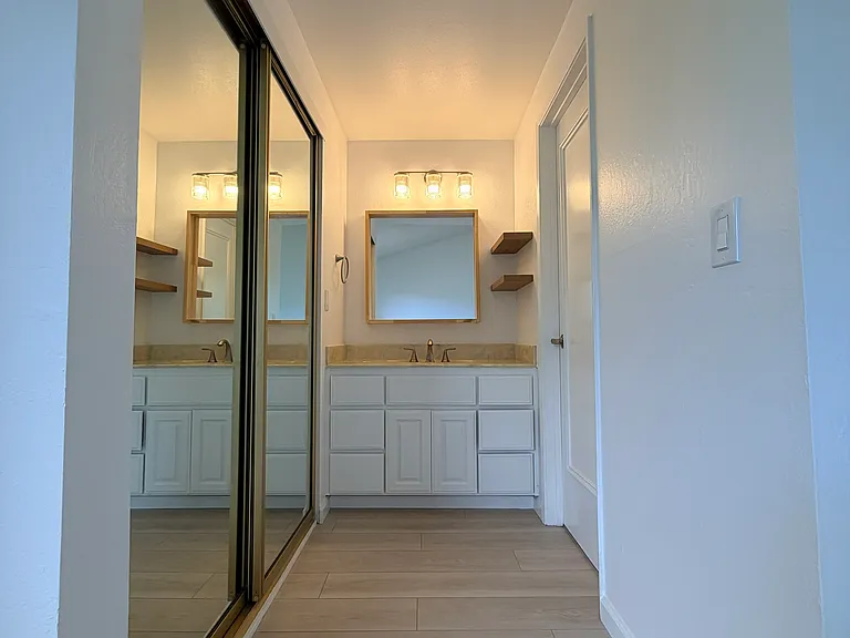 Newly renovated (2026) Master bedroom vanity area
Closet (Left, behind mirror sliding door)
Master bathroom (right)