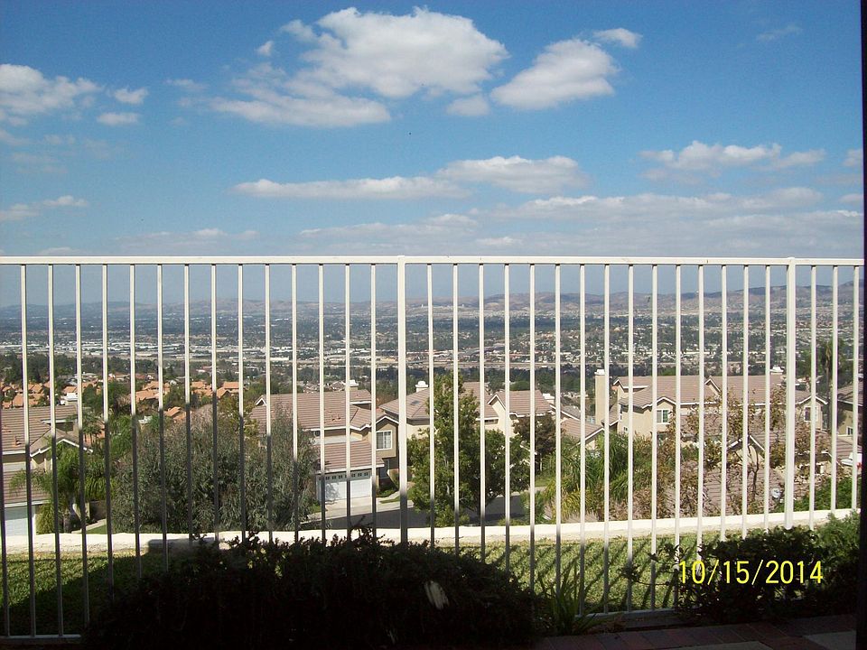 Standing at the back yard of the subject property overlooking the valley of city of Anaheim Hills