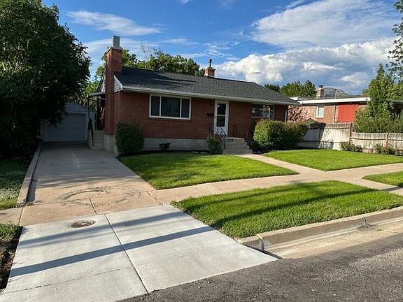 Detached garage behind house