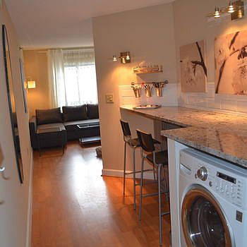 full size washer/dryer combo unit and miles of granite for w