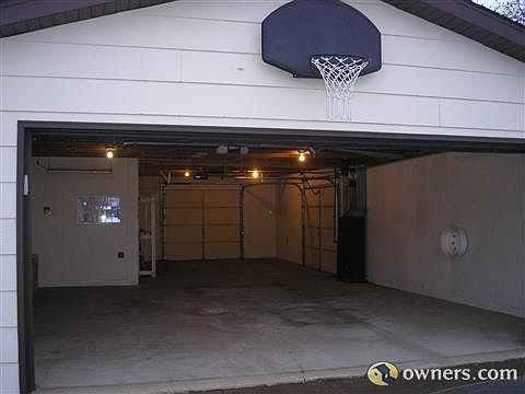 4 stall garage/3 overhead doors