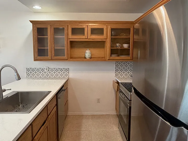 New refrigerator and stove. Plenty of storage. Starter cookware available.