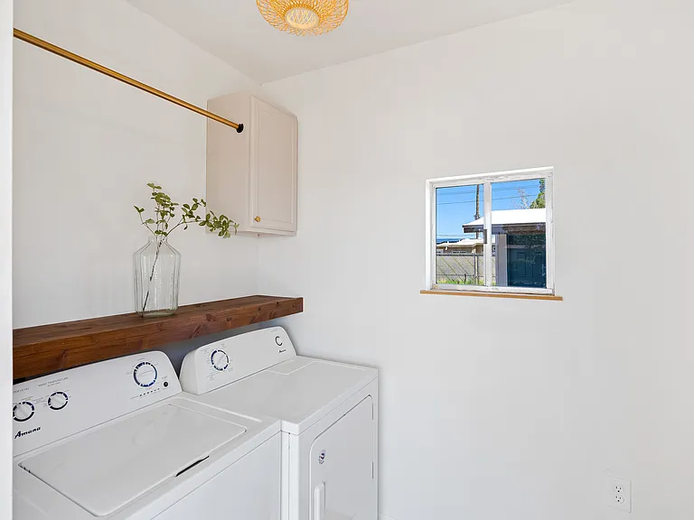 Private Laundry off Carport