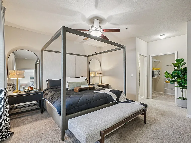 Luxury apartment homes featuring spacious bedrooms and modern design at Village at Broadstone Station