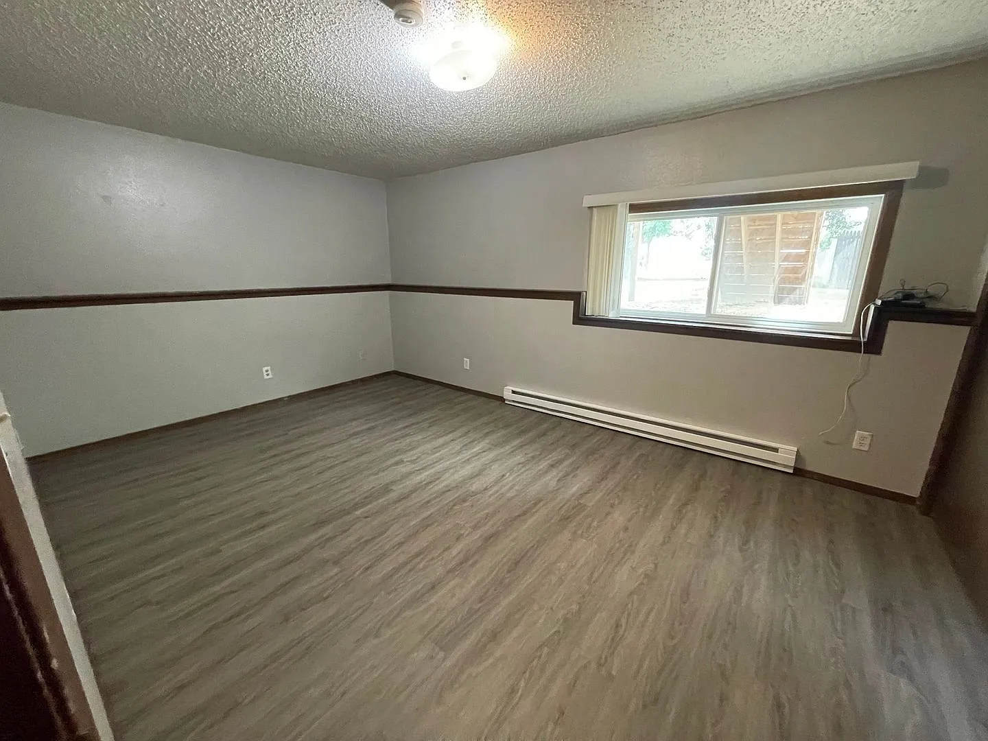 Spacious 2BR/1.5BA Townhome | Garage | Private Yard | In-Unit Laundry — Photo 2