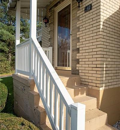 FRONT PORCH - ENTER THROUGH THE FRONT ENTRANCE AND INTO LIVING ROOM.