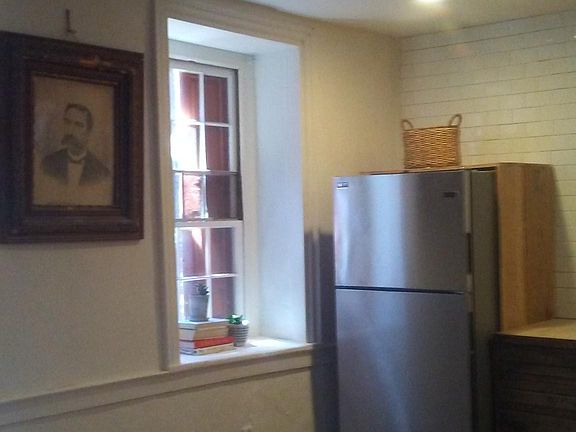 antique wood floors throughout, beamed ceilings and abundance of natural light