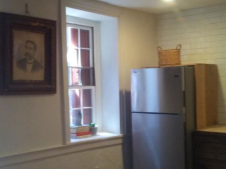 antique wood floors throughout, beamed ceilings and abundance of natural light