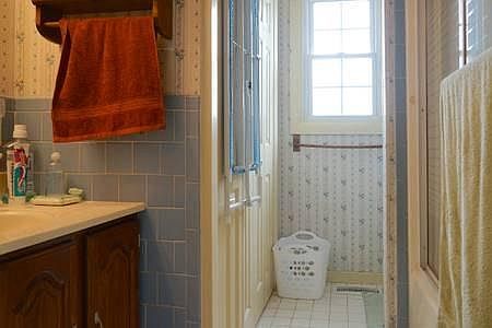 Bathroom, with washer & dryer (in closet)