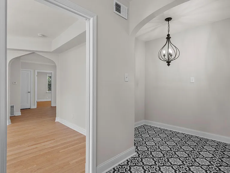 Looking from kitchen into breakfast nook/dining room.