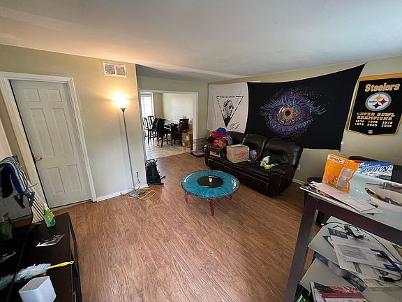 Living Room w/ full bathroom & open dining room