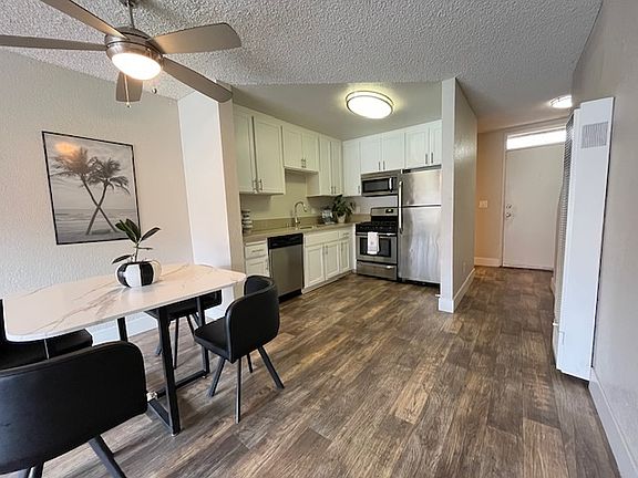 DINING ROOM AND KITCHEN/ FRONT DOOR + WALL HEATER