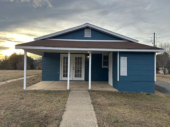 Double doors for easy access into the bonus room. Two outside storage areas. Good for kids bikes and yard supplies.