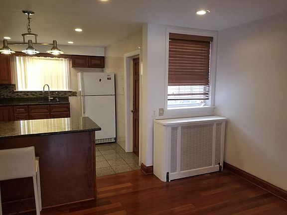 The other side of the eatin kitchen, with a view of the space for a small-med sized dining table